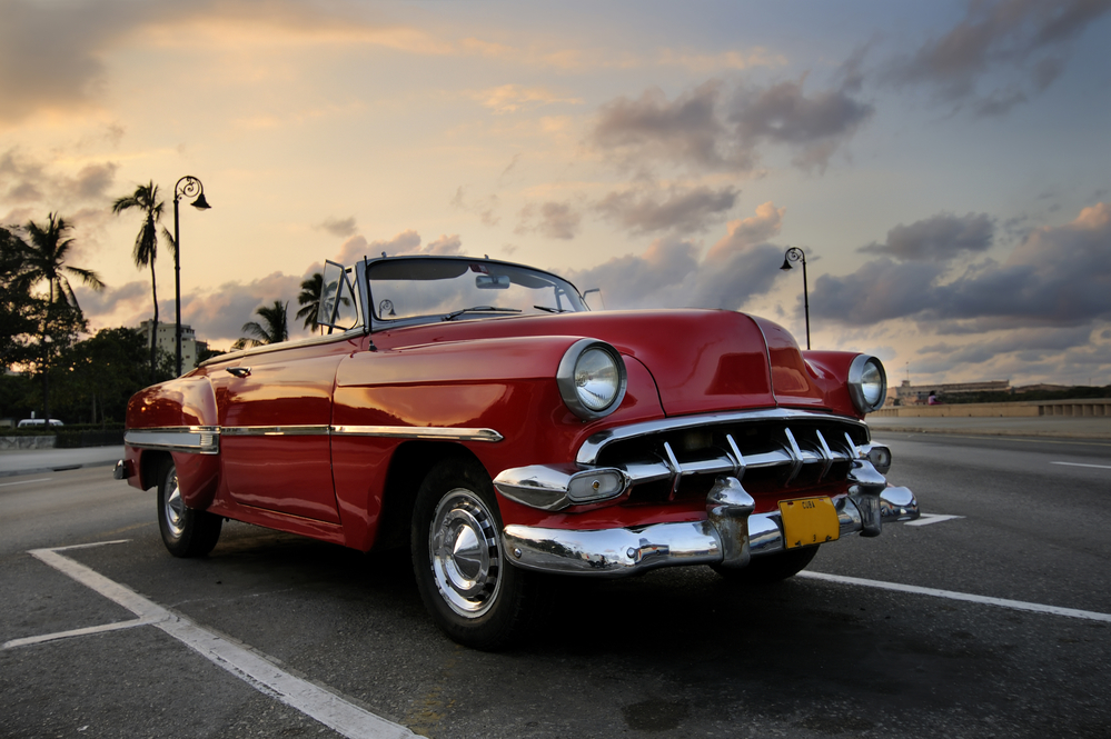 Red car in Havana sunset