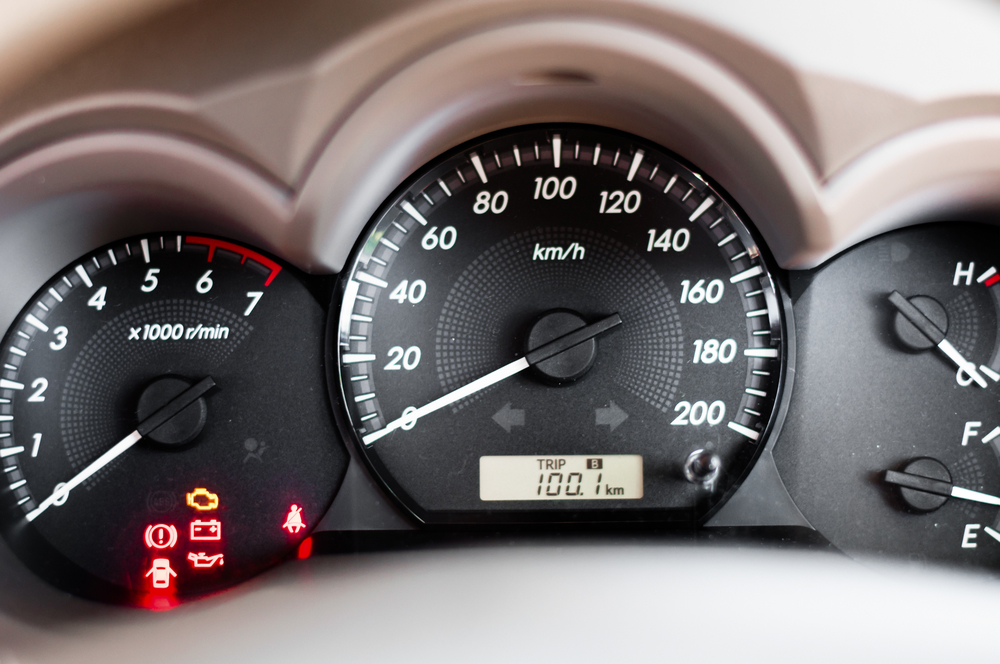 Close up of car dashboard and Odometer.