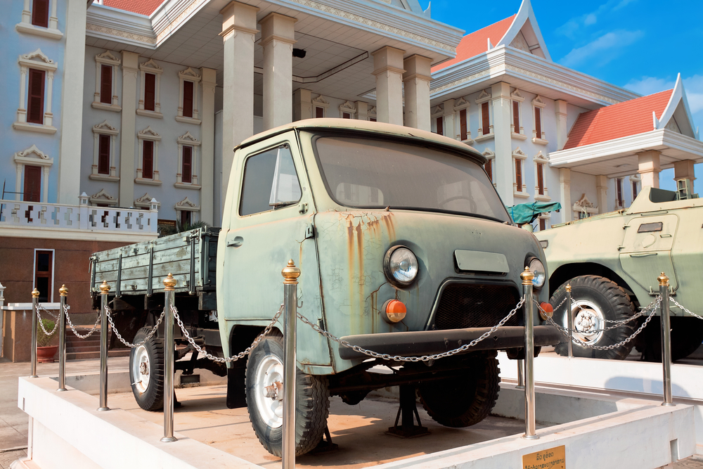 VIENTIANE, LAOS - FEBRUARY 19: Civilian and military vehicles su