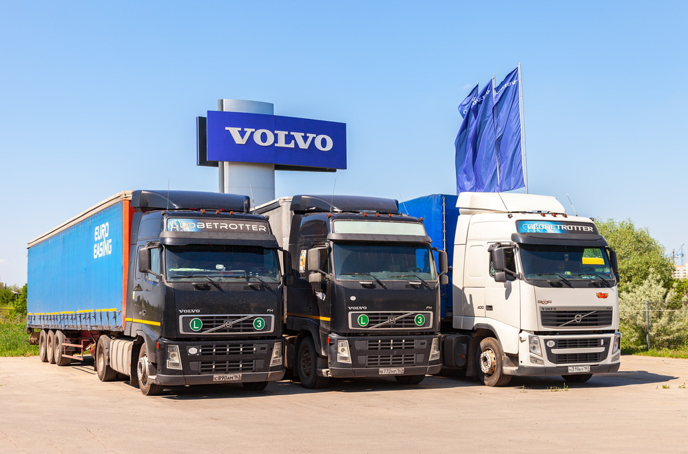 MAY 29, 2016: Volvo trucks parked at the service station in summer day. Volvo is a Swedish multinational automaker company