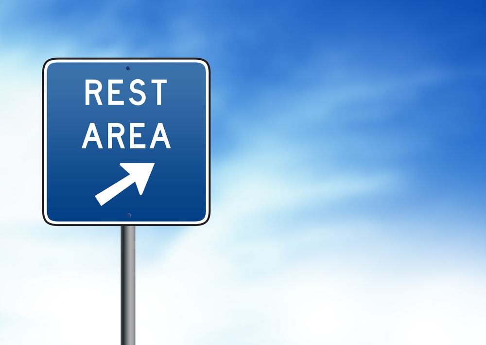 Blue Rest Area Road Sign on white background.