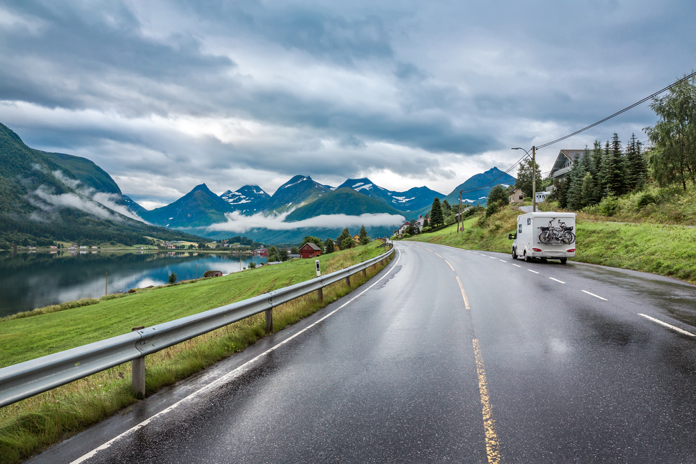 Caravan car travels on the highway.