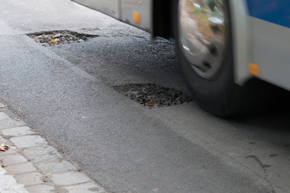 Conducción de automóviles sobre baches en el asfalto (min)