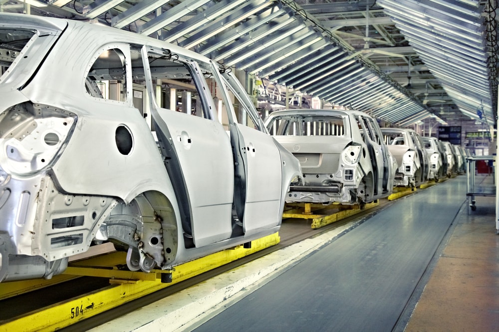 cars-on-assembly-line-min