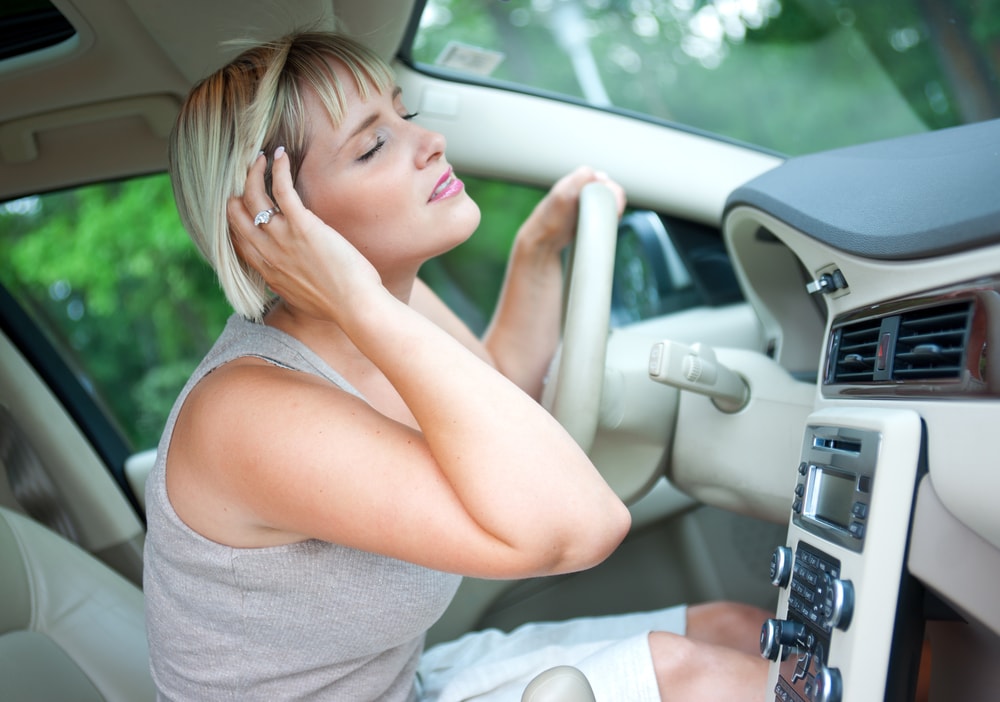 woman cooling in car