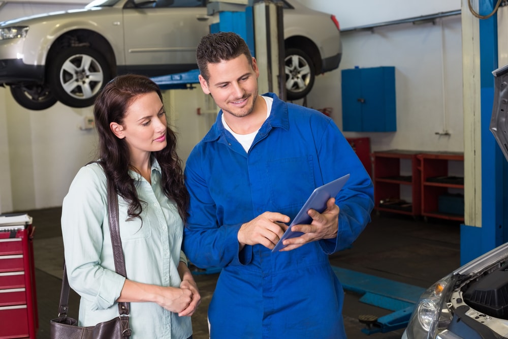 mechanic speaking to customer