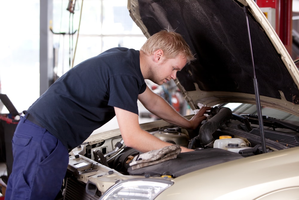 mechanic fixing a car