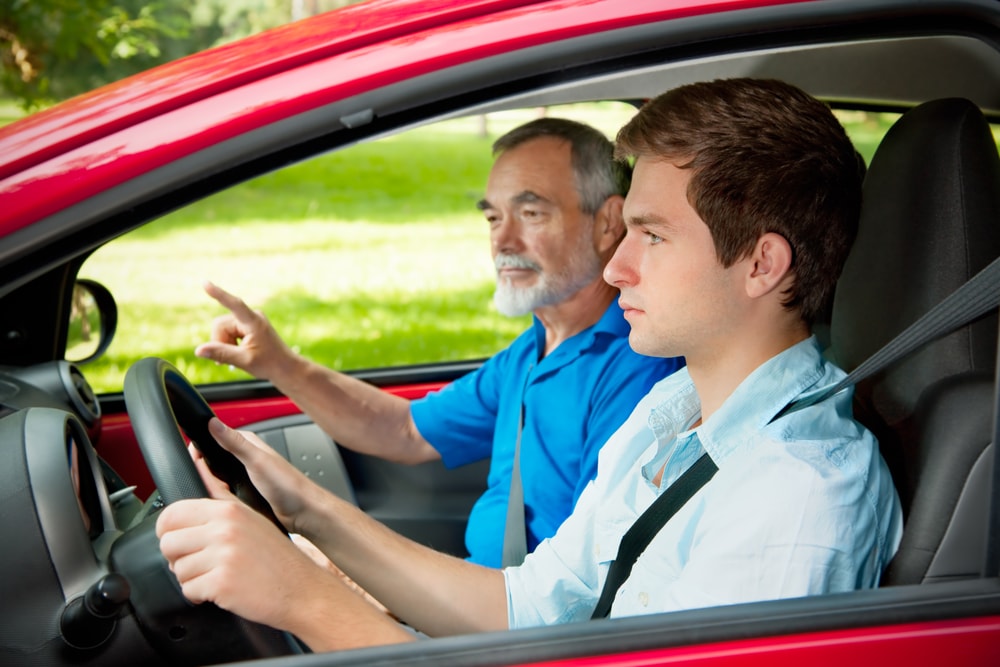 teen learning how to drive