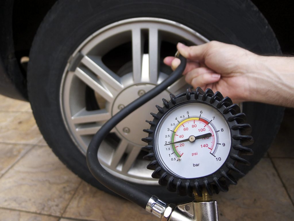 checking tire pressure