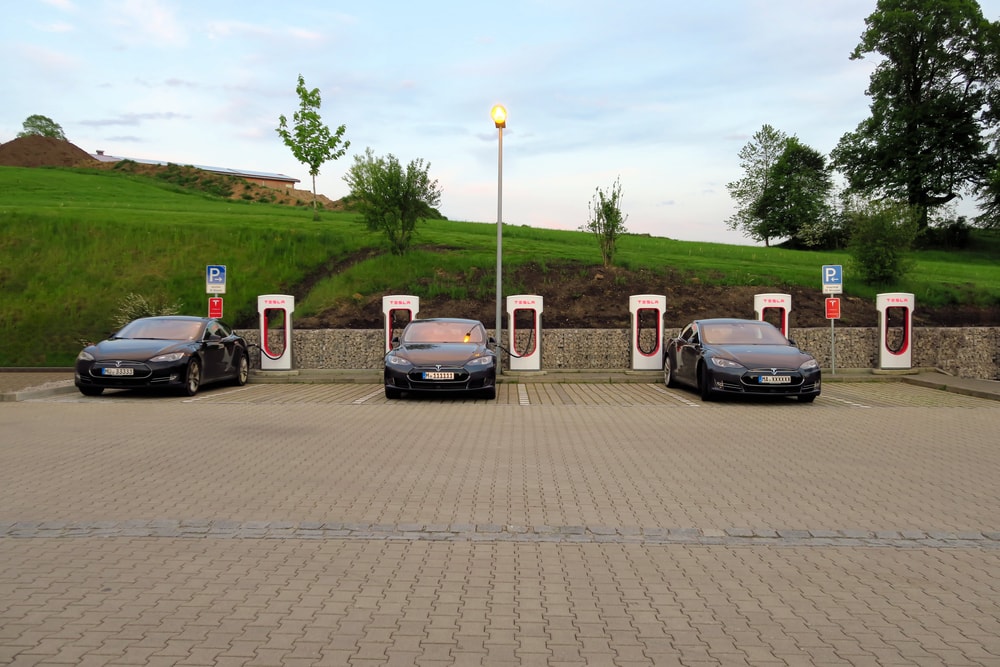 several teslas supercharging