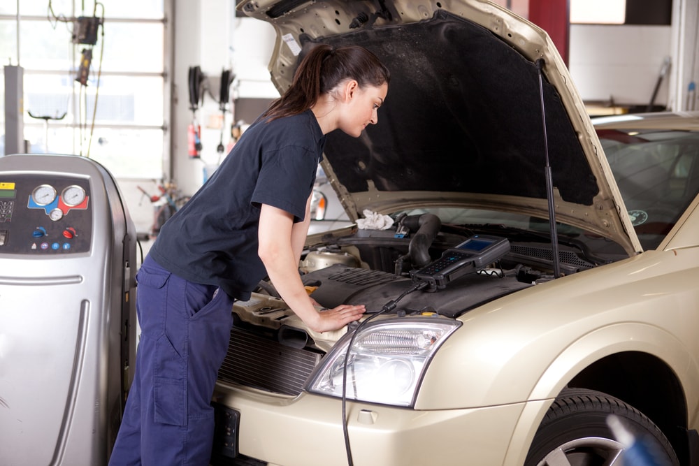 woman tuning a car