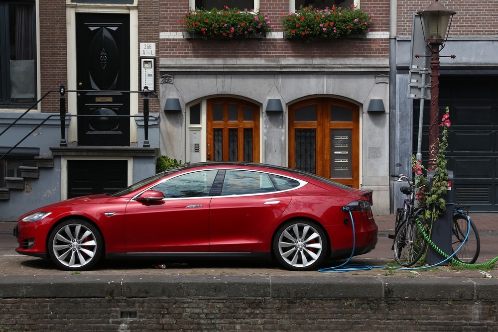 tesla parked and charging