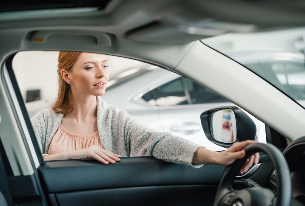 woman choosing a car