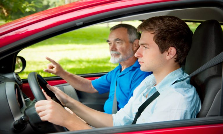 teen driver behind the wheel