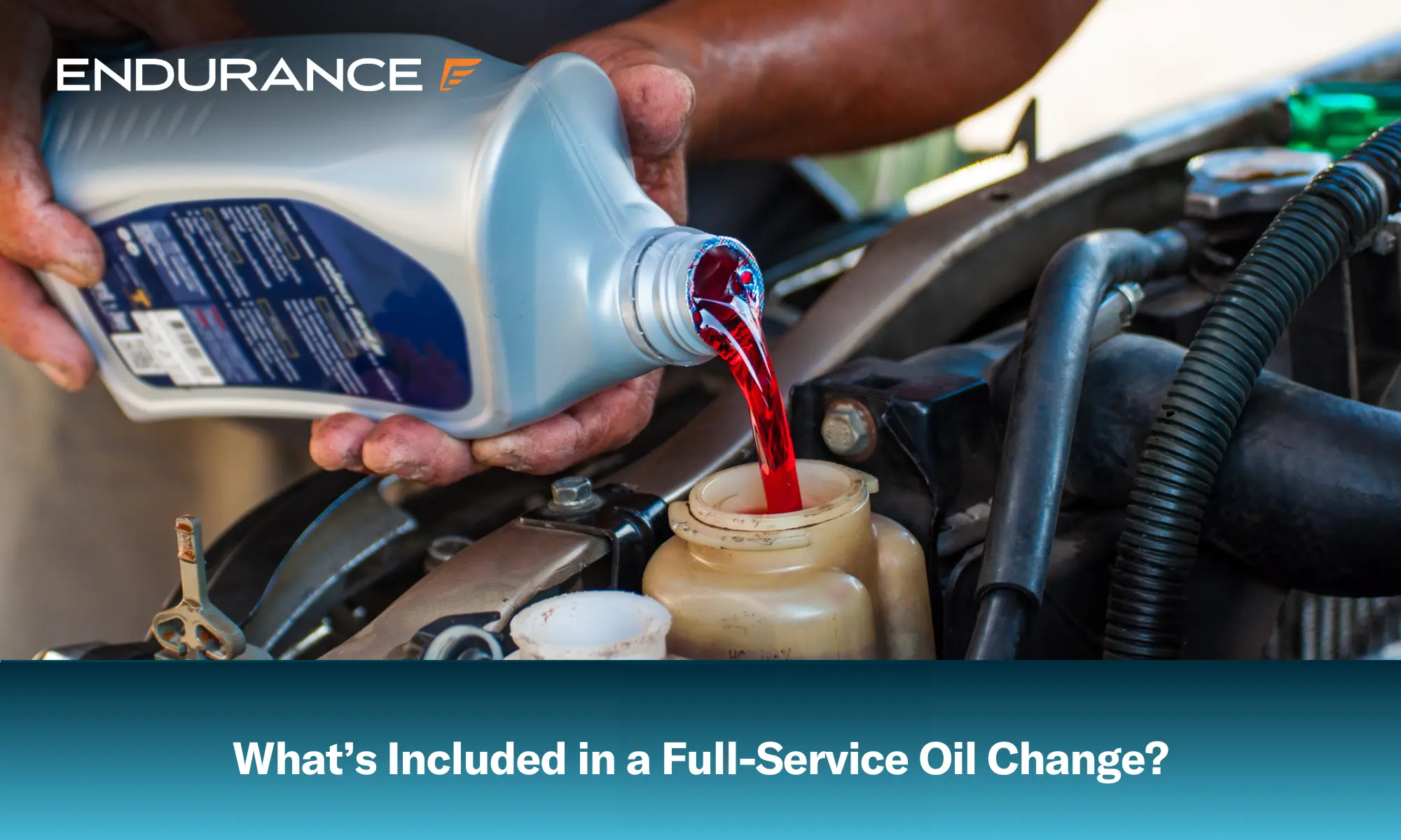 Close up of a mechanic filling oil at a service shop