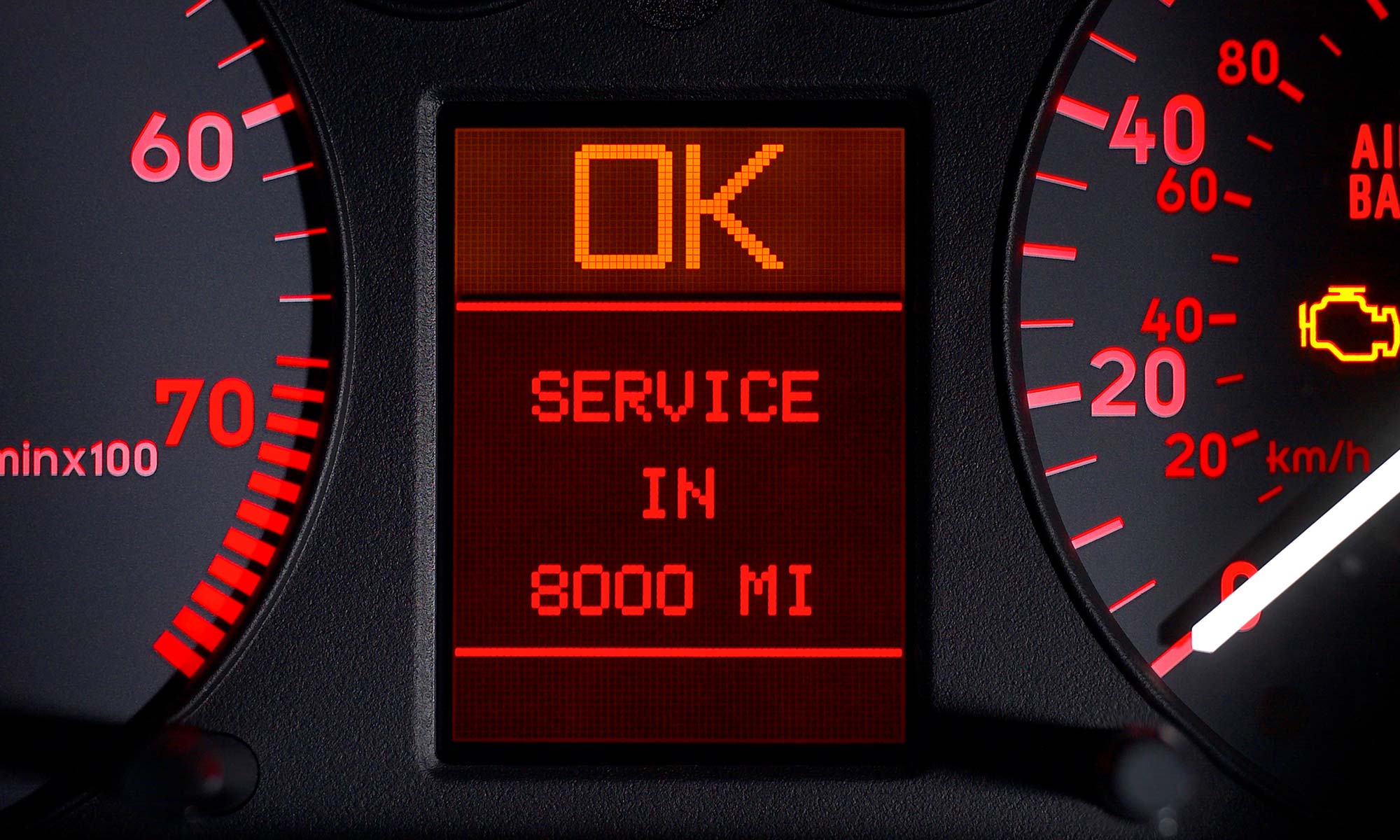 A car's odometer that reads,