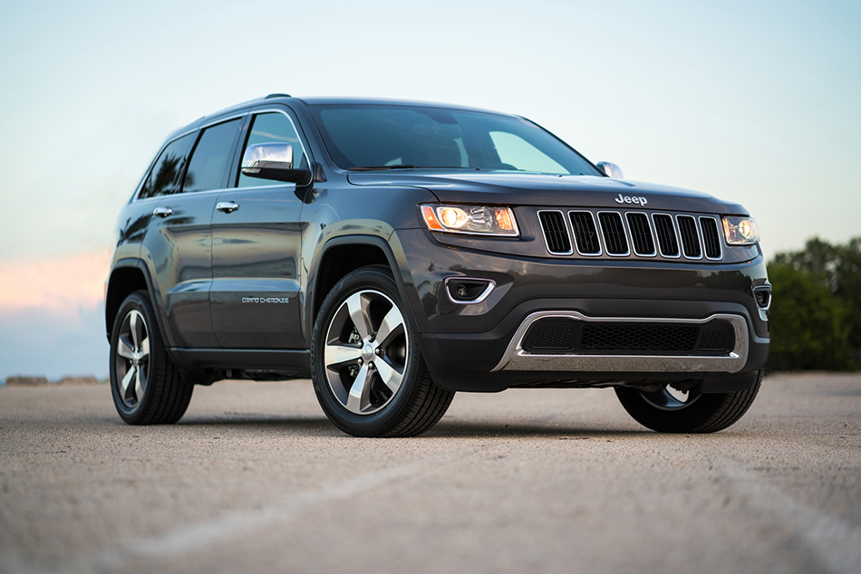 A graphite colored Jeep Grand Cherokee.