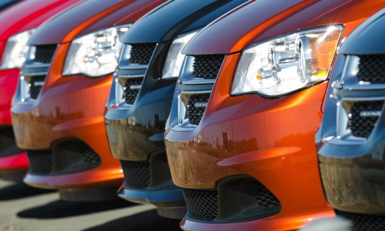 A Row of Dodge Grand Caravans