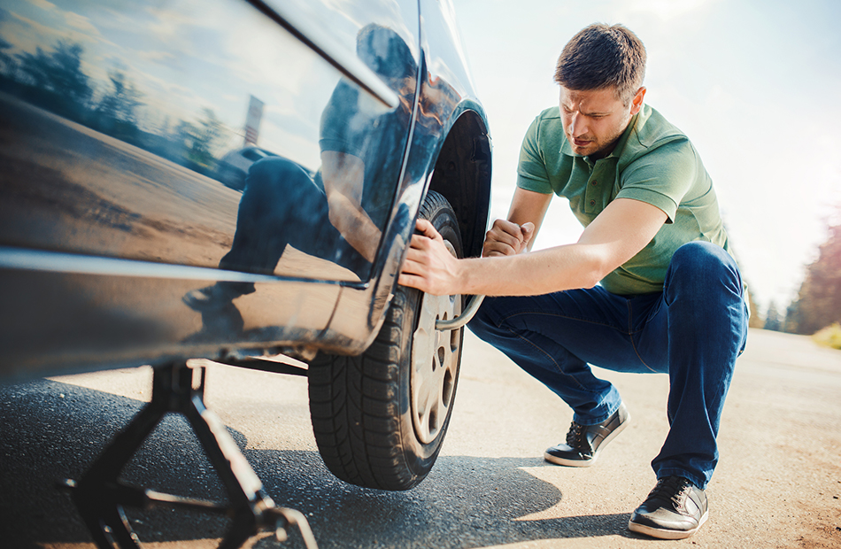 Replacing flat tire.