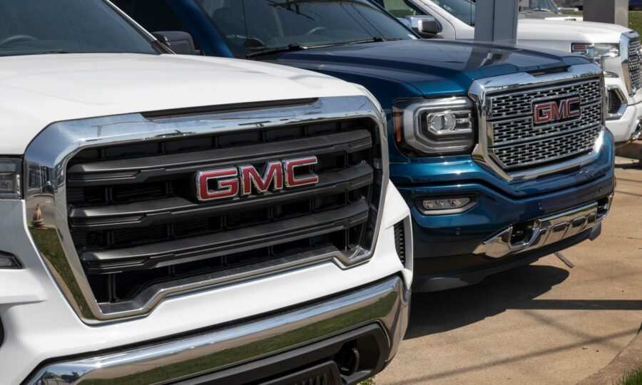 Two GMC Sierra trucks.