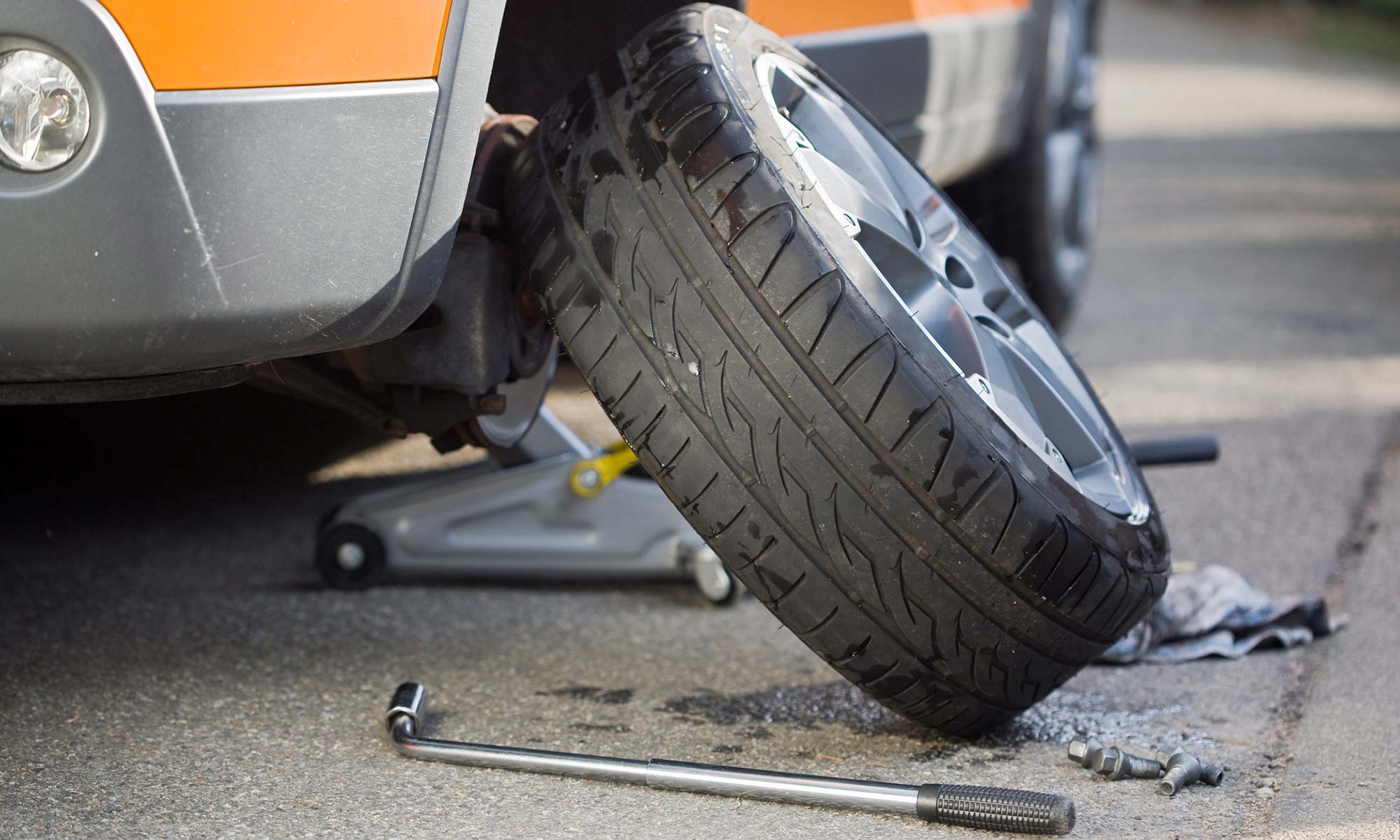 Changing a flat tire.