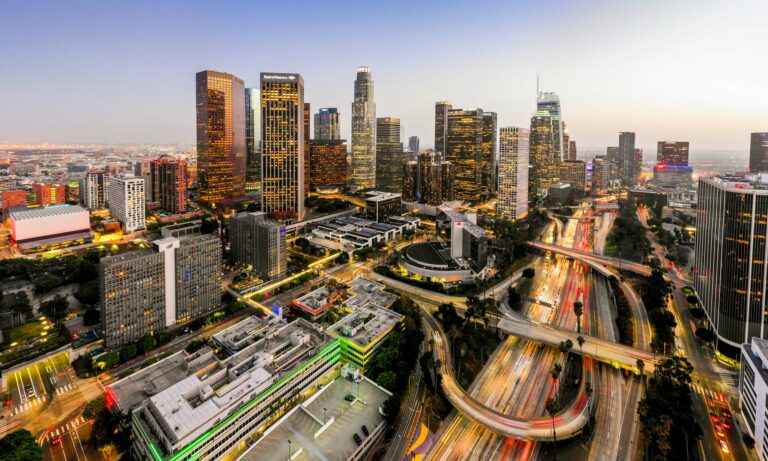 An aerial view of downtown Los Angeles, California at twilight.