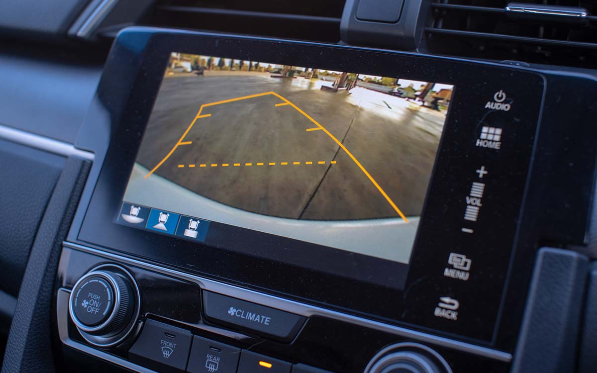 A closeup of a car's rearview/backup camera.