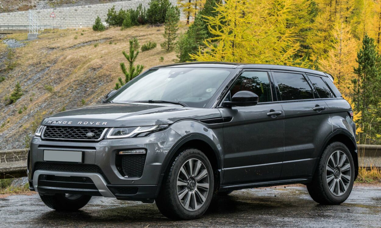 A Range Rover Evoque parked outside.