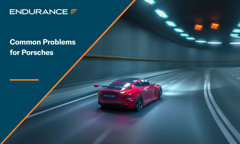 A red Porsche driving in a tunnel