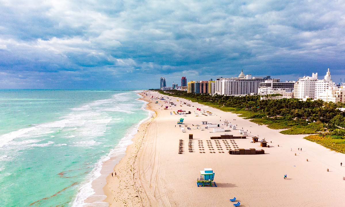 An aerial view of a beach in Miami, FL.