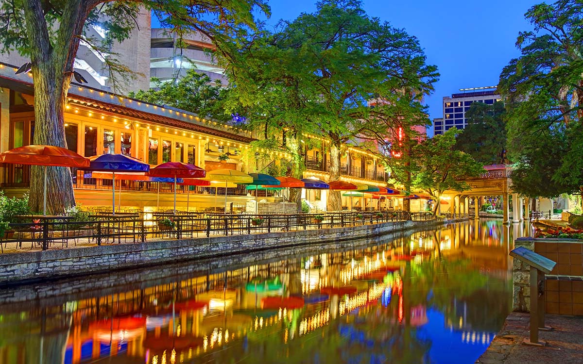 A view of the San Antonia River Walk at dusk in San Antonio, Texas.