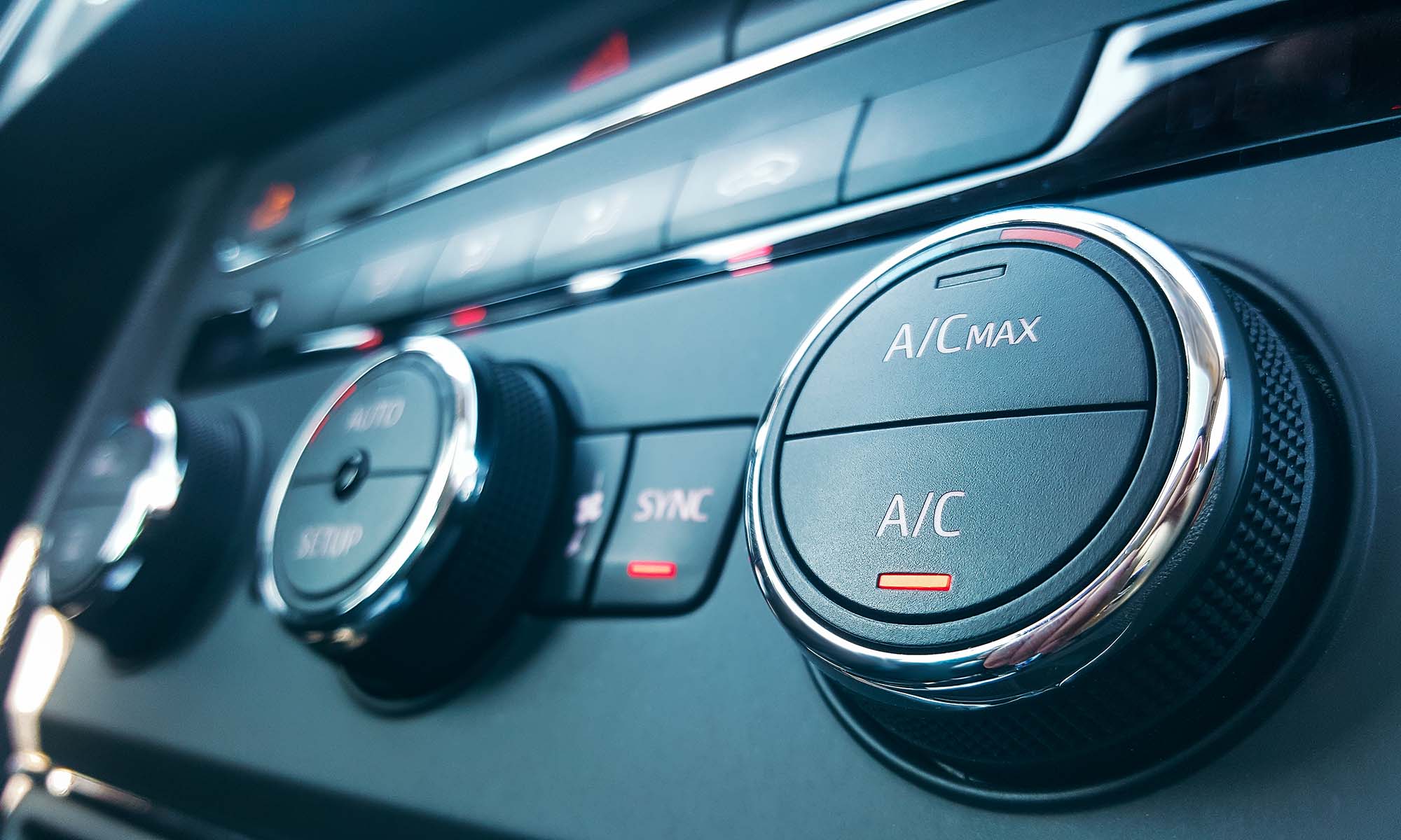 A closeup of a car's air conditioning dial on the dashboard, which is covered when you have an Endurance auto protection plan.
