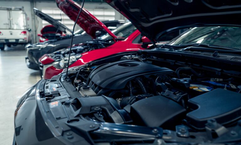 Auto repair shop with cars waiting for maintenance