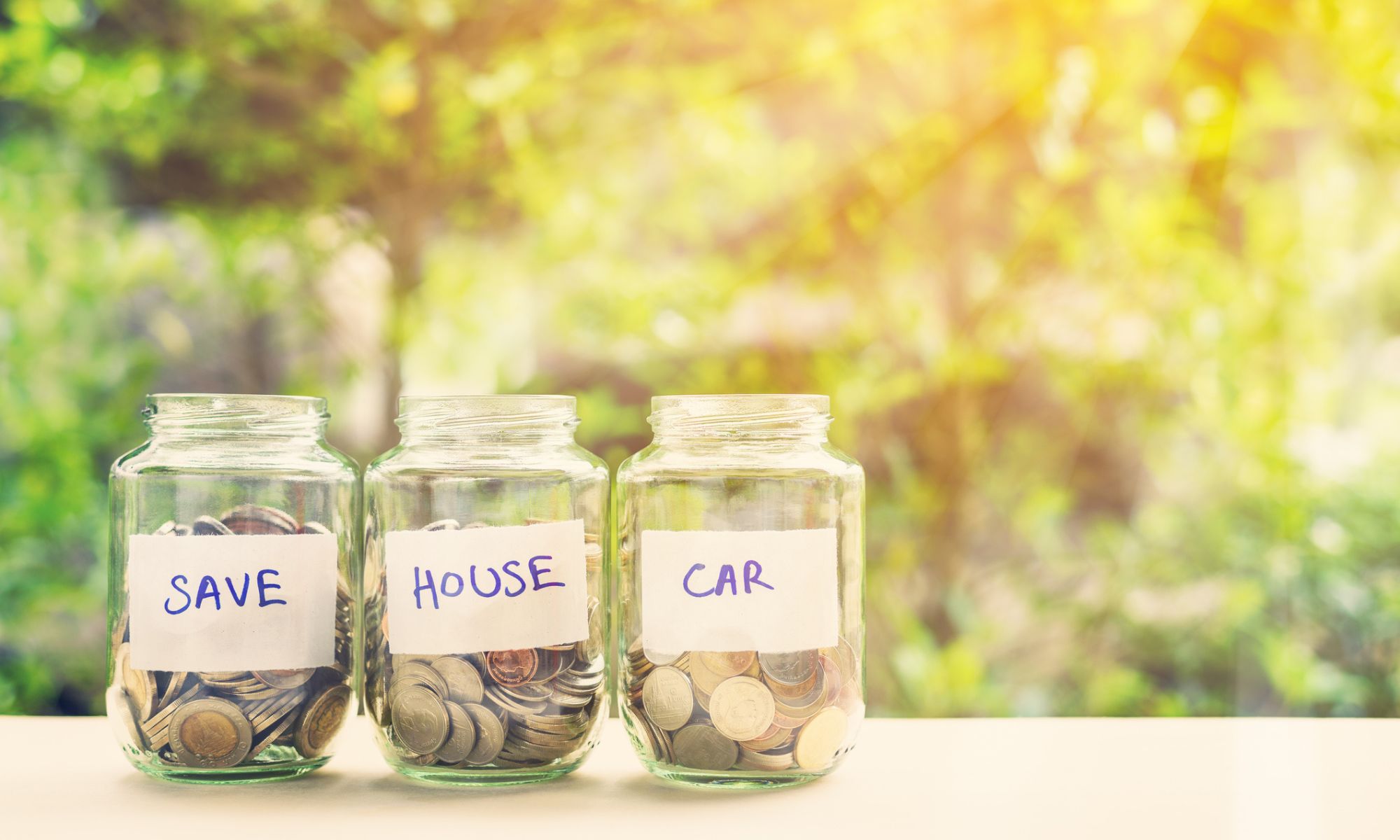 Saving money jars for car maintenance