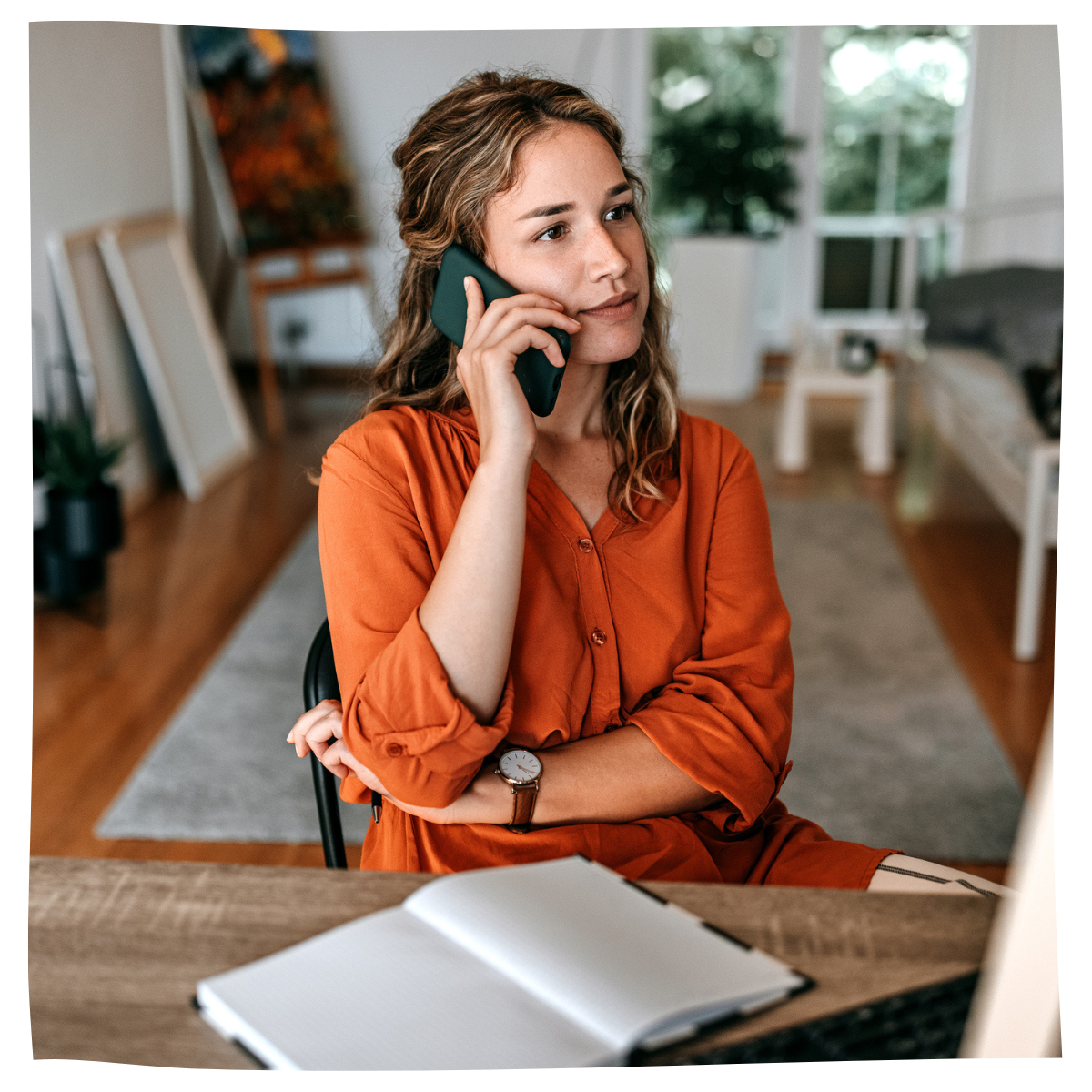 Woman talking on smart phone to cancel her extended warranty