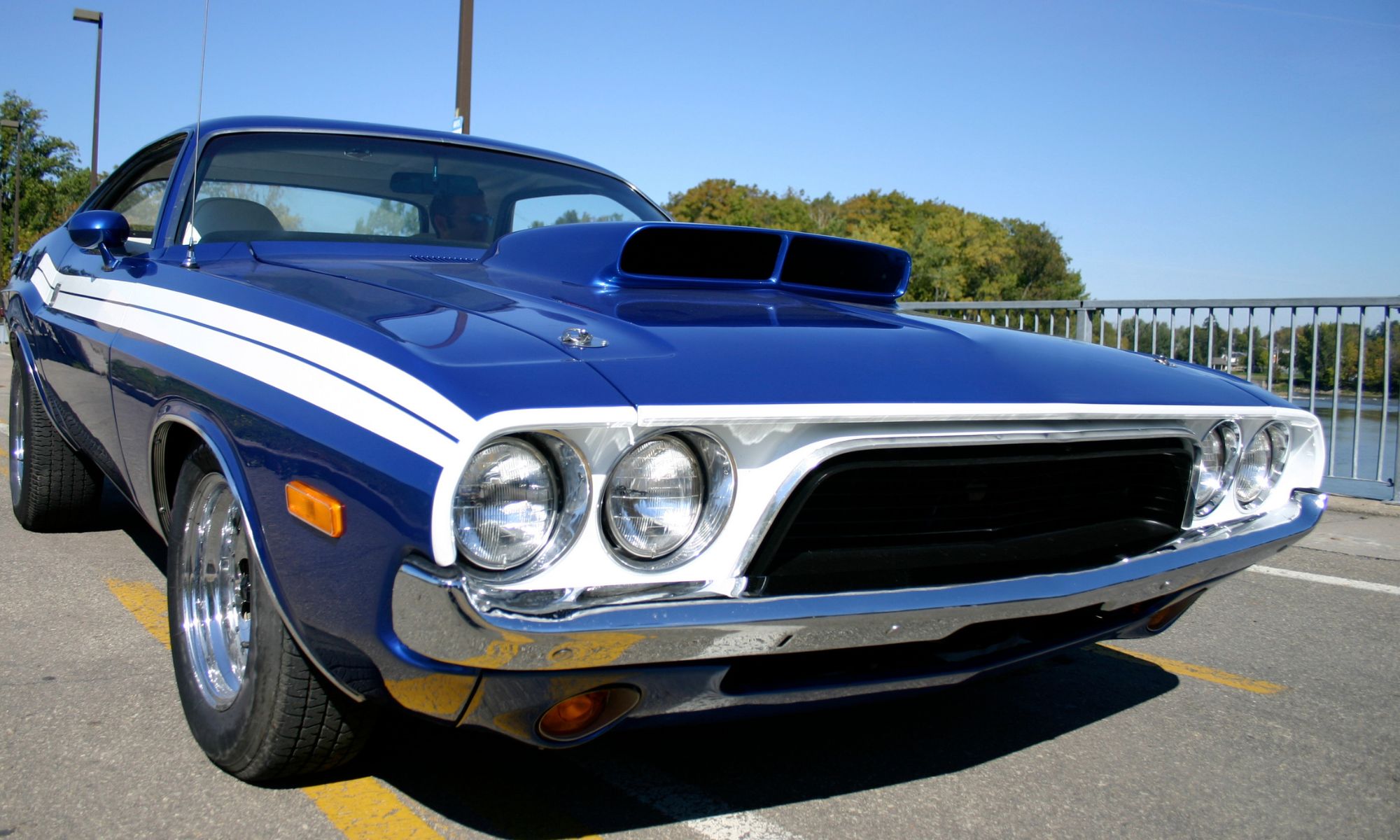 Blue classic Dodge Charger parked on the road