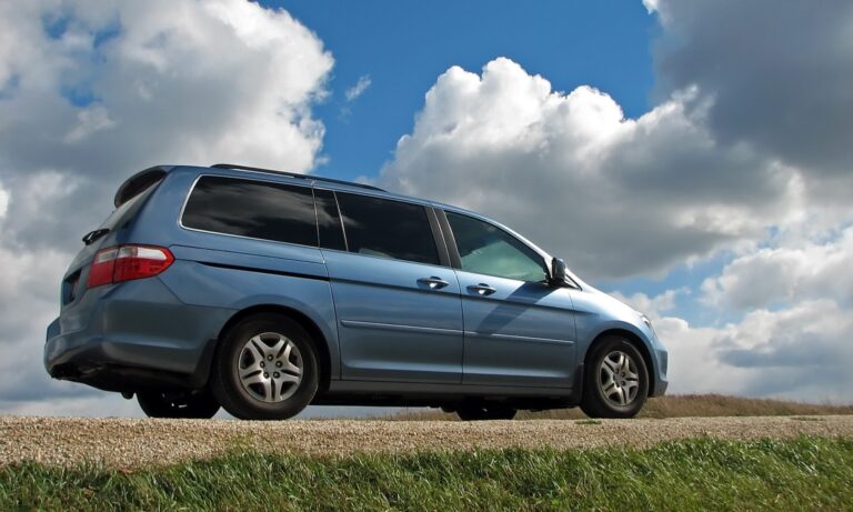 A Honda van parked on the road