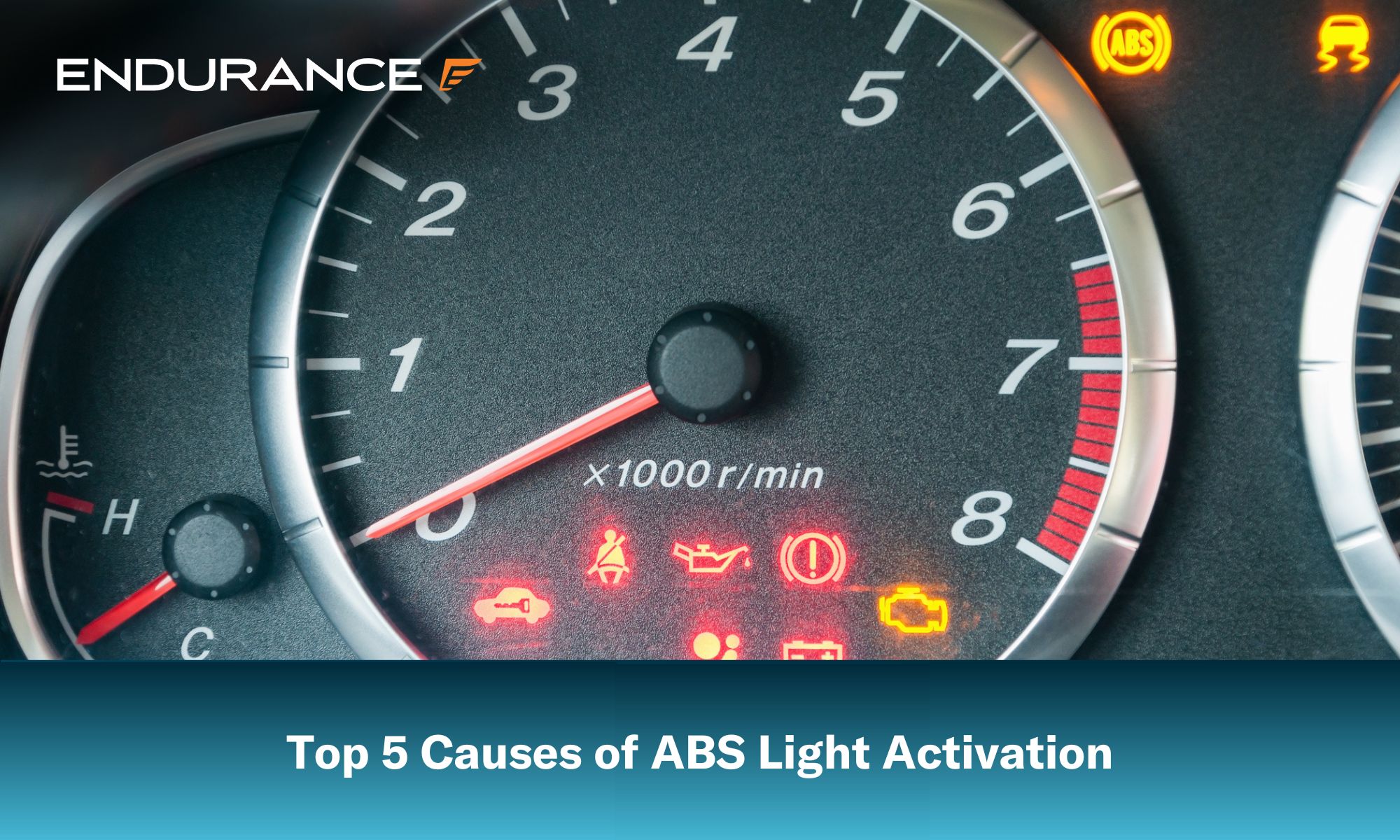 Closeup of car tachometer with many illuminated indicators like ABS light