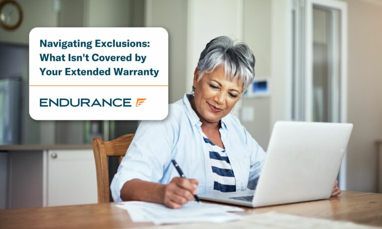 Woman using a laptop to look at her extended warranty contract