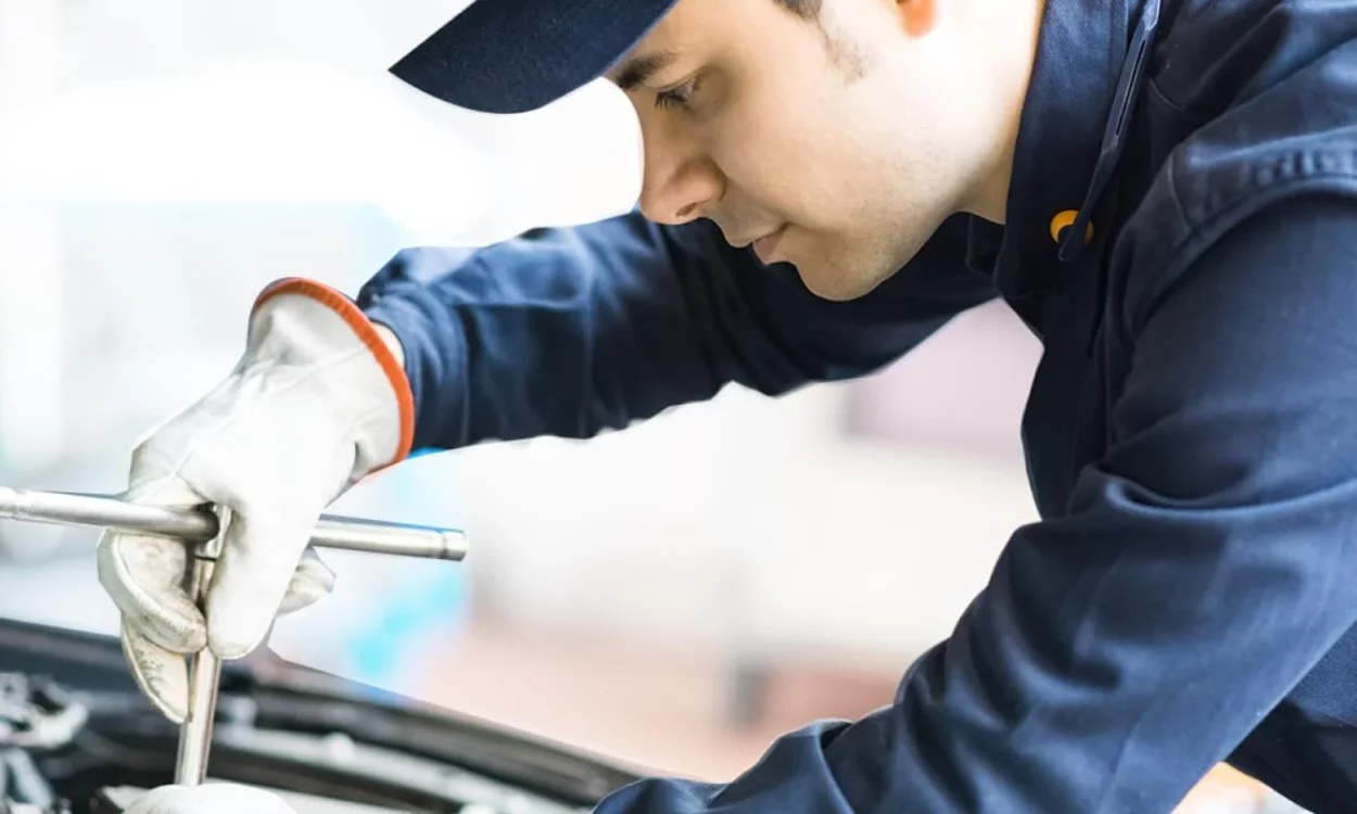 Man Working On Car