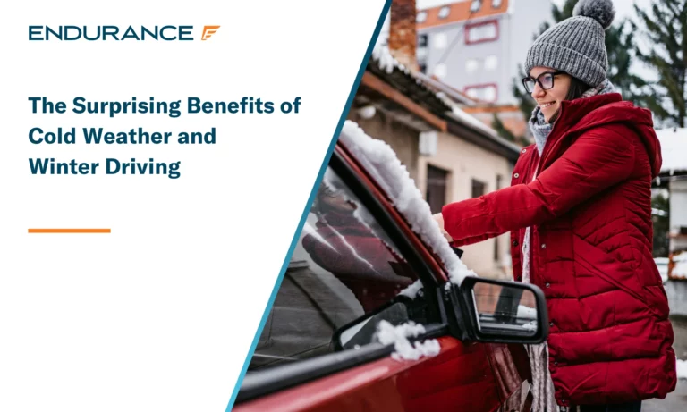 Woman cleaning snow off her car