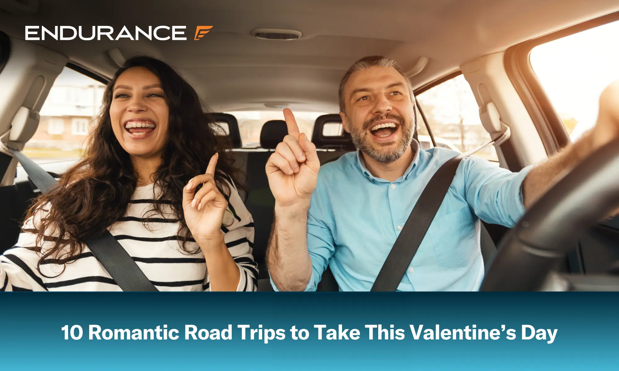 Excited couple enjoying music in the car