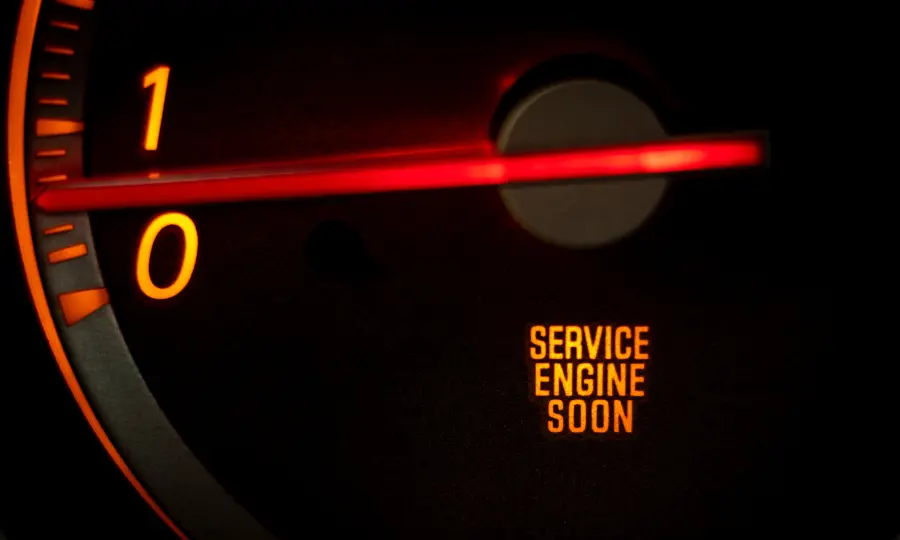 Service engine soon light on a car dashboard