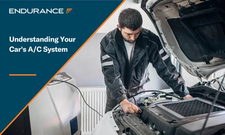Young mechanic charging AC in a car
