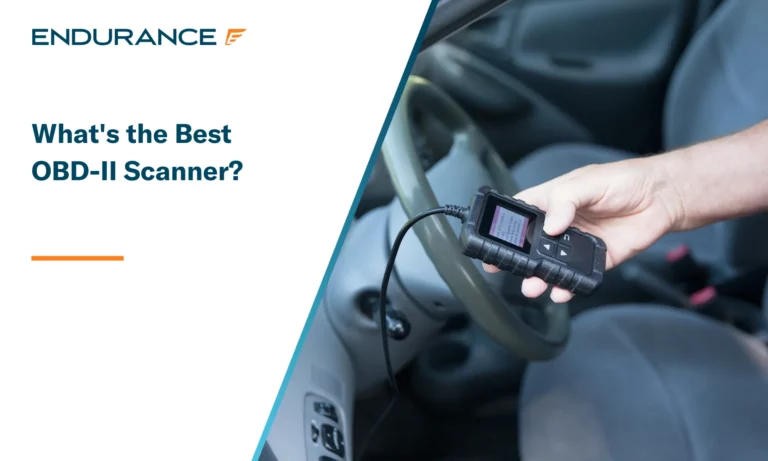 Auto mechanic using car diagnostic scanner tool