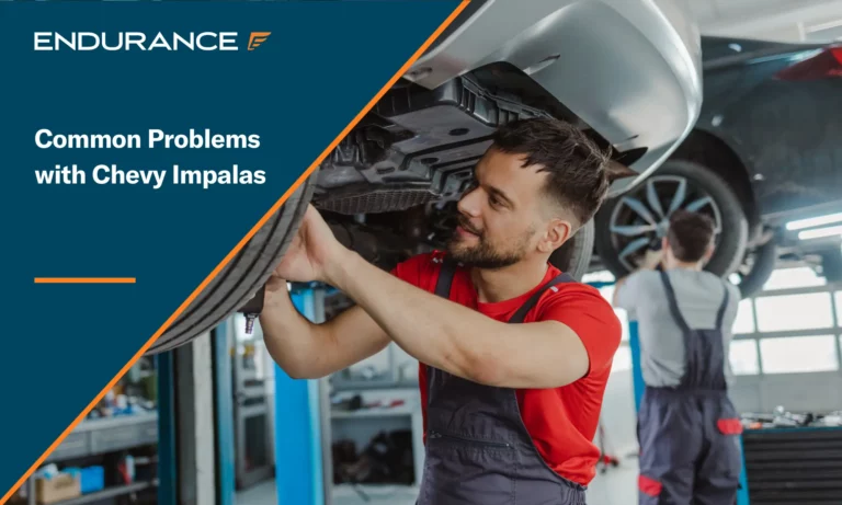 Automotive technician inspecting a client vehicle