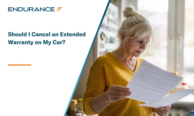 Senior woman looking at a paper contract in her home