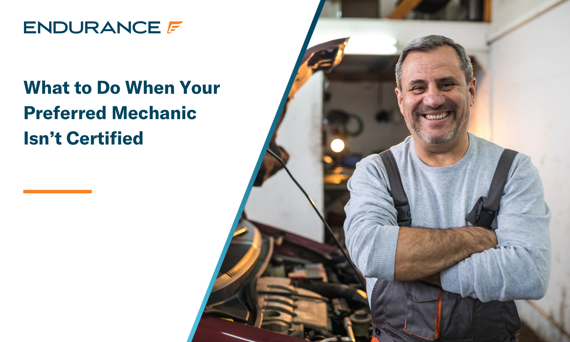Smiling older male mechanic standing in front of a car