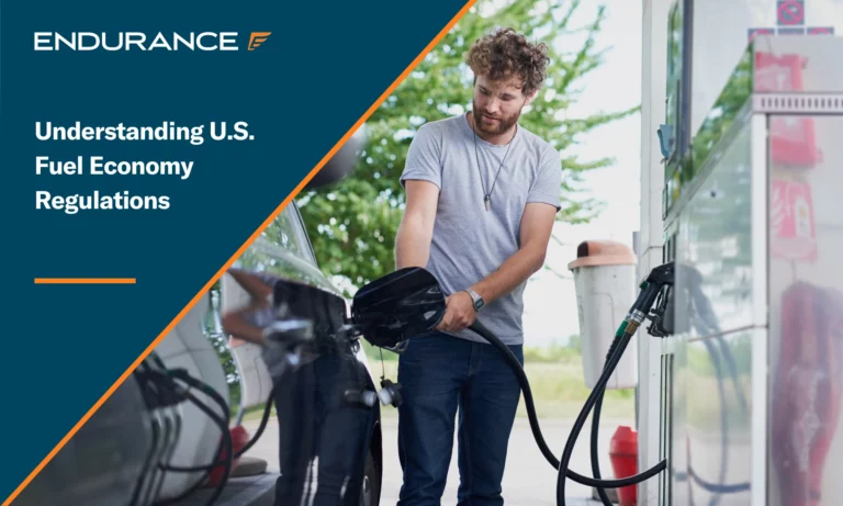 A young man refueling his car at a gas station