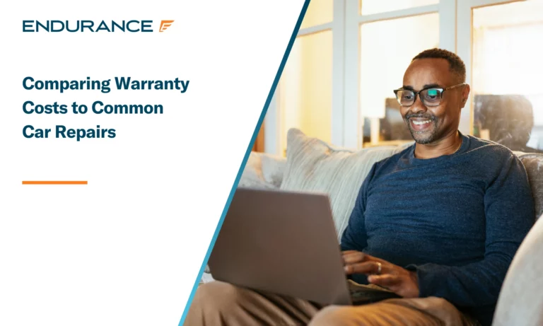 Older African American man with glasses working on his laptop